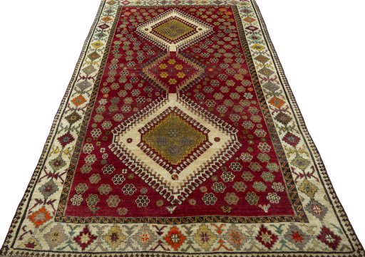 Surface texture of 1970s Persian Gabbeh rug with natural Wool and intricate pattern