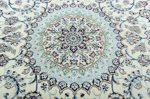 Central medallion detail of 2000s Nain rug from Iran / Persia
