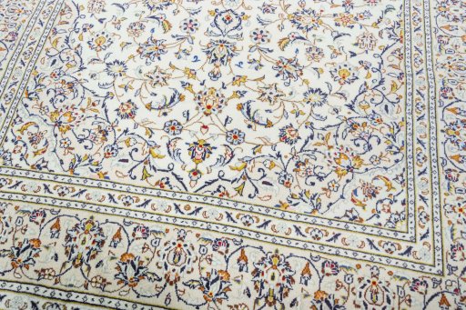 Close-up detail of 2000s Kashan rug from Iran / Persia showing Wool weave