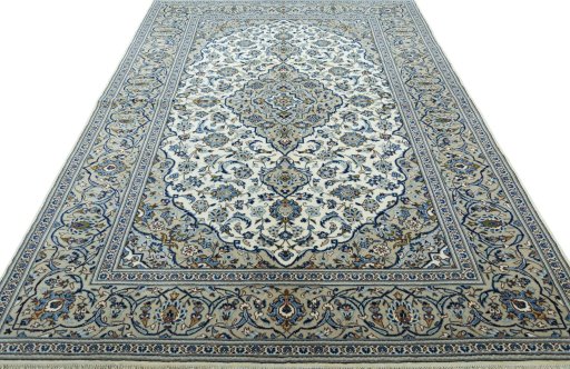 Surface texture of 2000s Kashan rug with natural Wool and intricate pattern