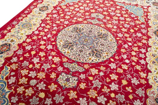 Backside of handmade 2000s Kashan rug showing knot structure and weave density