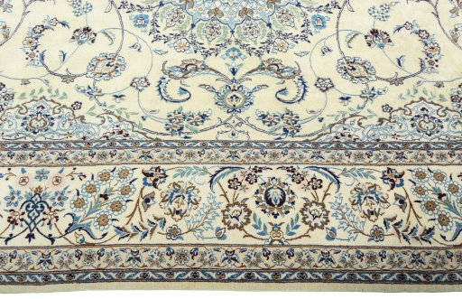 Corner detail of 2000s Nain rug showing border pattern and Wool pile