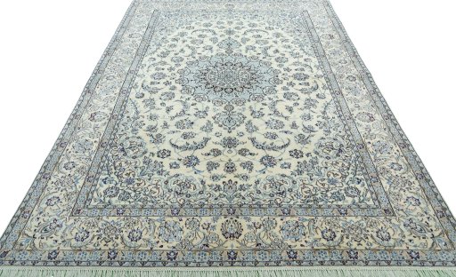 Surface texture of 2000s Nain rug with natural Wool and intricate pattern