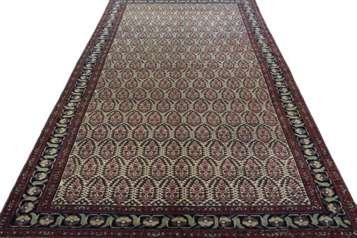 Surface texture of 1930s Hamedan rug with natural Wool and intricate pattern