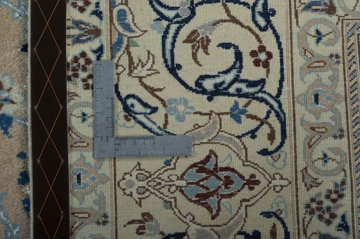 Backside of handmade 2000s Nain rug showing knot structure and weave density