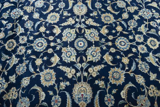 Central medallion detail of 2000s Kashan rug from Iran / Persia