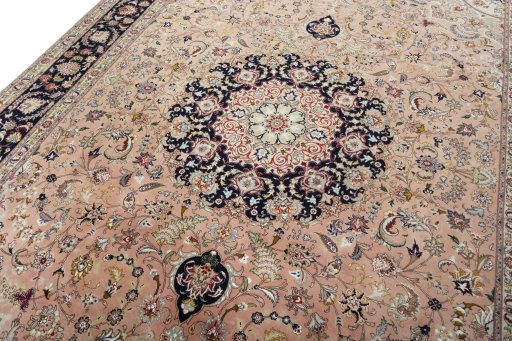 Backside of handmade 2000s Tabriz 50/60/70 Raj rug showing knot structure and weave density