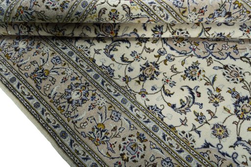 Close-up detail of 2000s Kashan rug from Iran / Persia showing Wool weave