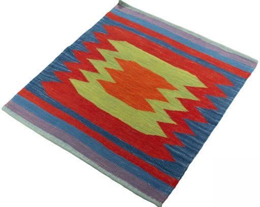 Corner detail of New Kilim Sofre rug showing border pattern and Wool pile