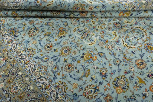Close-up detail of 2000s Kashan rug from Iran / Persia showing Wool weave