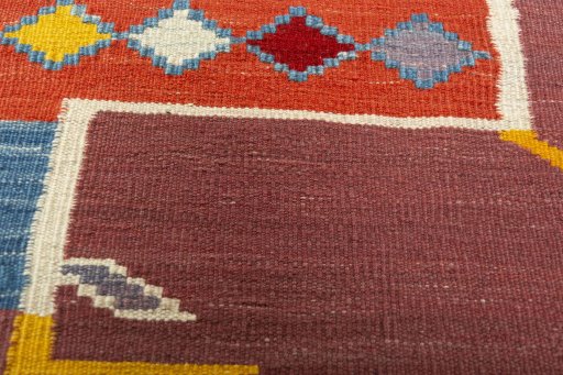 Backside of handmade New Kilim Dastan rug showing knot structure and weave density