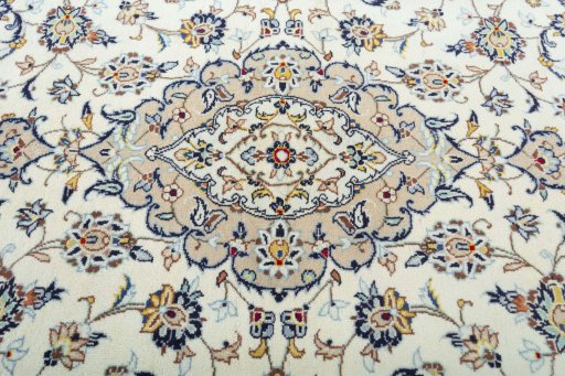 Central medallion detail of 2000s Kashan rug from Iran / Persia