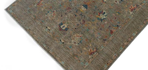 Backside of handmade New Farahan rug showing knot structure and weave density