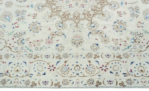Corner detail of 2000s Nain rug showing border pattern and Wool pile