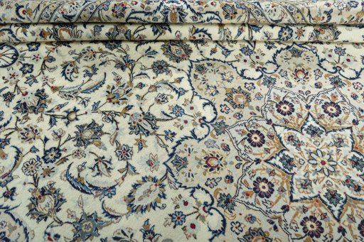 Close-up detail of 2000s Kashan rug from Iran / Persia showing Wool weave