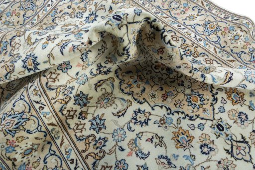 Surface texture of New Kashan rug with natural Wool and intricate pattern