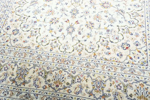 Close-up detail of 2000s Kashan rug from Iran / Persia showing Wool weave