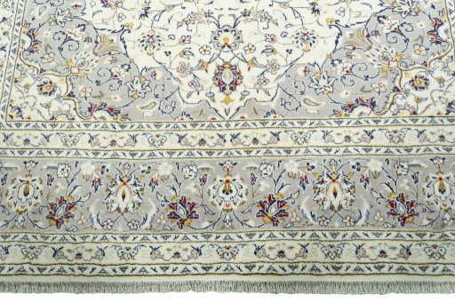 Full view of New Kashan rug from Iran / Persia, 301 × 203 cm in Beige tones