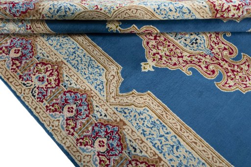Close-up detail of 2000s Kerman rug from Iran / Persia showing Wool weave