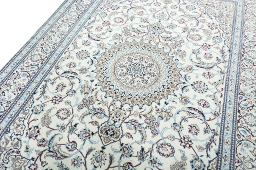 Backside of handmade 2000s Nain rug showing knot structure and weave density
