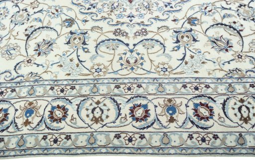 Corner detail of 2000s Nain rug showing border pattern and Wool pile