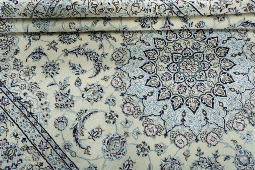 Close-up detail of 2000s Nain rug from Iran / Persia showing Wool weave