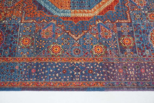 Backside of handmade New Mamluk rug showing knot structure and weave density