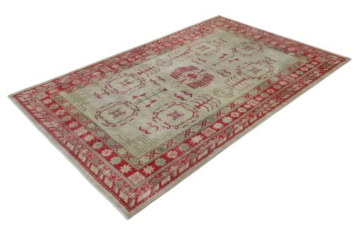 Corner detail of 1950s Antique Carpets rug showing border pattern and Wool pile