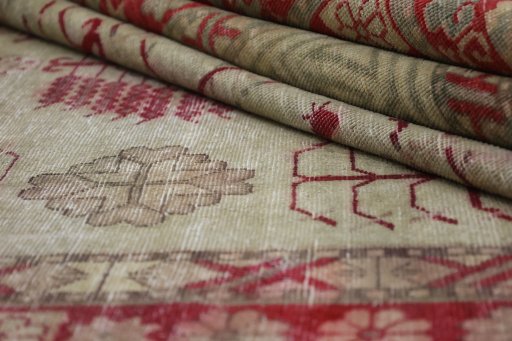 Close-up detail of 1950s Antique Carpets rug from Uzbekistan showing Wool weave