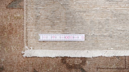 Full view of 1910s Antique Carpets rug from Uzbekistan, 239 × 152 cm in Brown tones