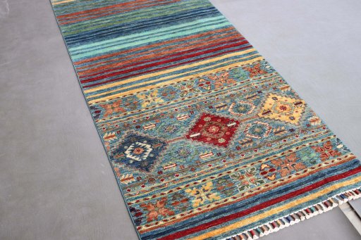 Full view of New Samarkand rug from Pakistan, 252 × 84 cm in Multi Color tones