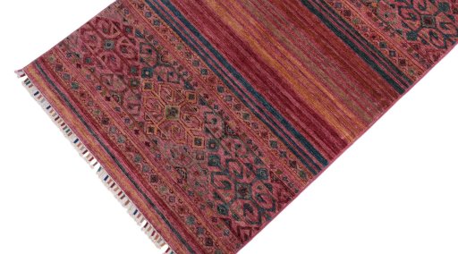 Backside of handmade New Samarkand rug showing knot structure and weave density