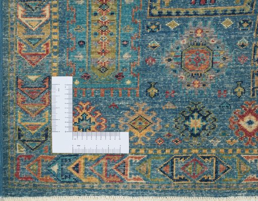 Corner detail of New Samarkand rug showing border pattern and Wool pile