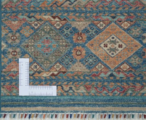 Corner detail of New Samarkand rug showing border pattern and Wool pile