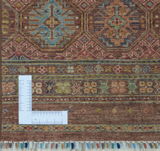 Corner detail of New Samarkand rug showing border pattern and Wool pile