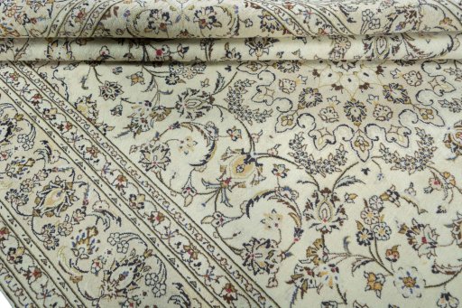 Close-up detail of 2000s Kashan rug from Iran / Persia showing Wool weave