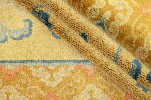 Corner detail of 1920s Antique Carpets rug showing border pattern and Wool pile