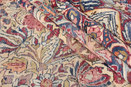 Backside of handmade 1900s Antique Carpets rug showing knot structure and weave density