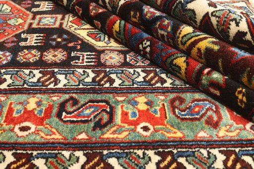 Close-up detail of 1900s Antique Carpets rug from Iran / Persia showing Wool weave