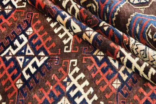 Close-up detail of 1880s Antique Carpets rug from Uzbekistan showing Wool weave