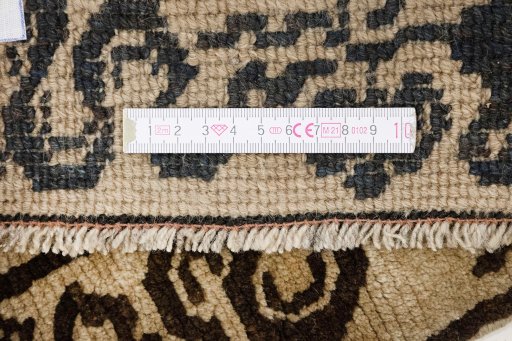 Full view of 1900s Antique Carpets rug from China, 167 × 78 cm in Beige tones