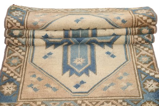 Corner detail of 1920s Antique Carpets rug showing border pattern and Wool pile