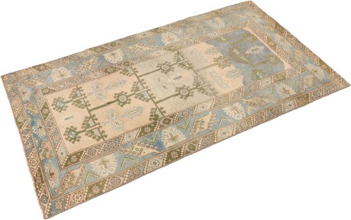 Corner detail of 1920s Antique Carpets rug showing border pattern and Wool pile