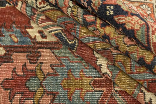 Corner detail of 1900s Antique Carpets rug showing border pattern and Wool pile