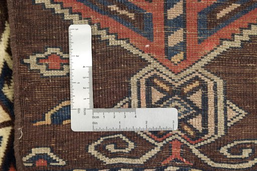 Close-up detail of 1880s Antique Carpets rug from Uzbekistan showing Wool weave