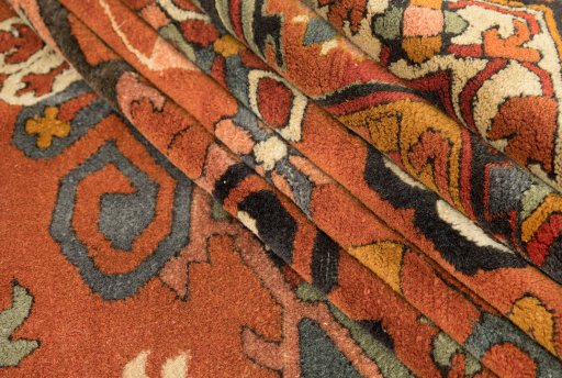 Corner detail of 1930s Antique Carpets rug showing border pattern and Wool pile