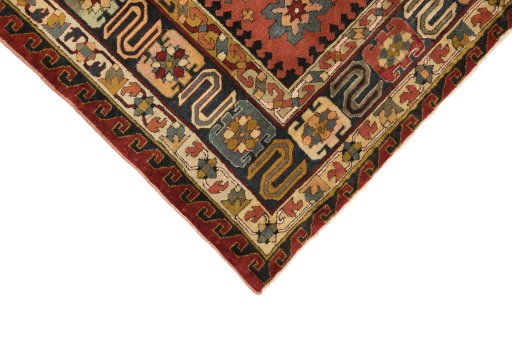 Backside of handmade 1930s Antique Carpets rug showing knot structure and weave density