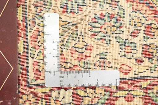 Corner detail of 1900s Antique Carpets rug showing border pattern and Wool pile