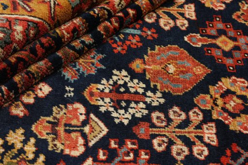 Full view of 1880s Antique Carpets rug from Iran / Persia, 276 × 121 cm in Dark blue tones