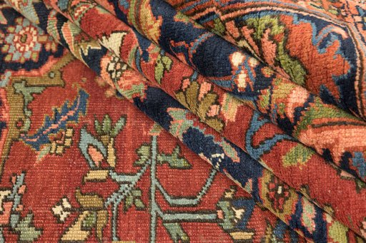 Close-up detail of 1900s Antique Carpets rug from Iran / Persia showing Wool weave